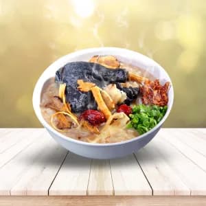 25. Black Herbal Chicken Congee