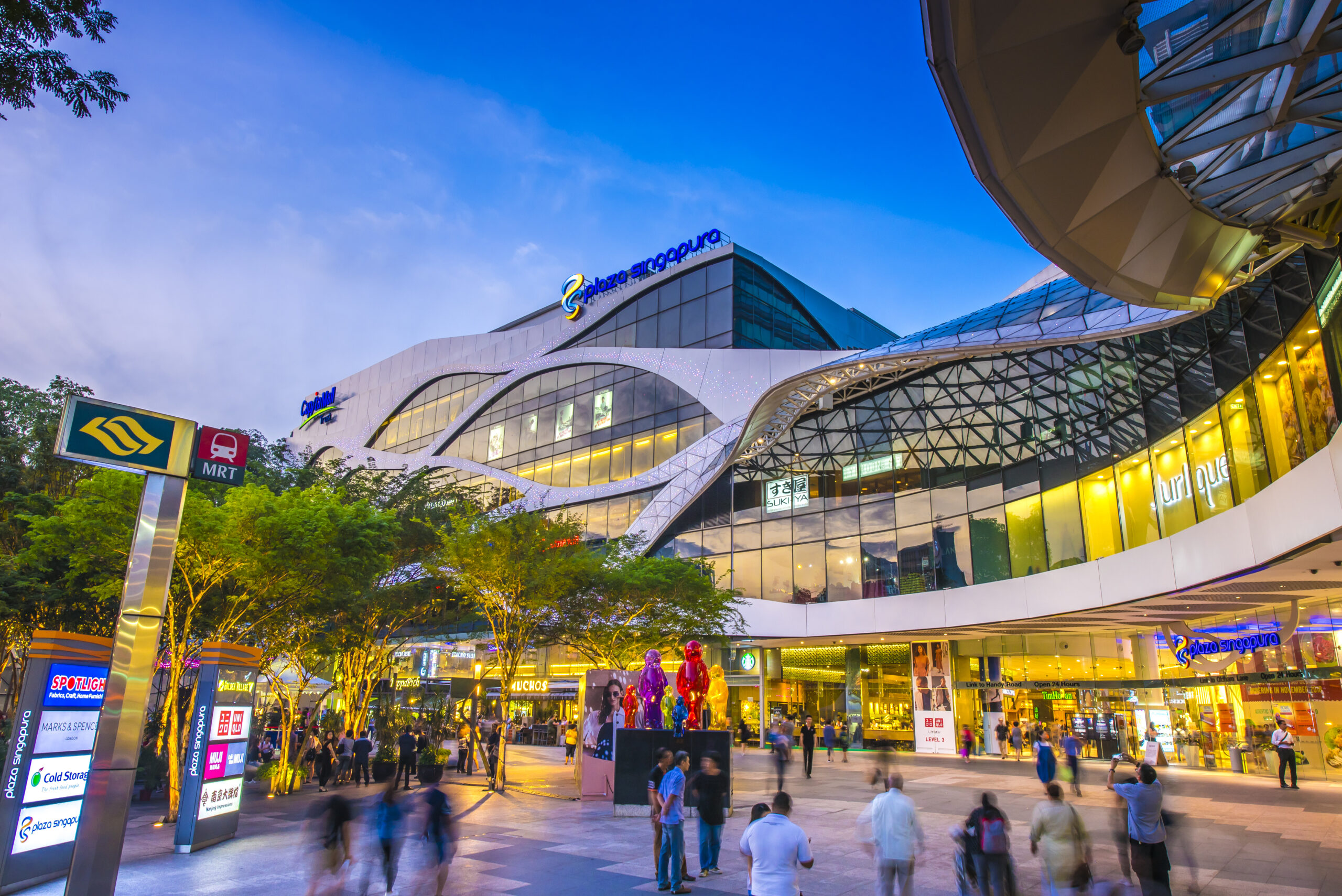 the USP is food / dining . Plaza Singapura, a bustling mall on Orchard Road, Singapore, renowned for its diverse food and dining options, with an attractive modern entrance showcasing various restaurant and cafe signs.